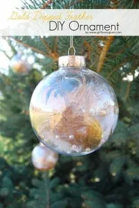 Gold Dipped Feather DIY Ornament on www.girllovesglam.com #christmas #tutorial