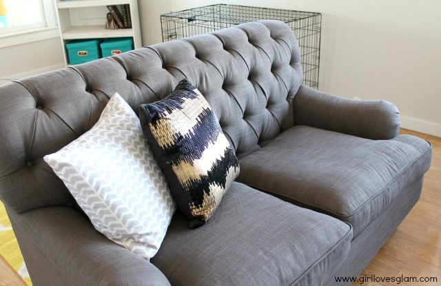 Gray tufted couch