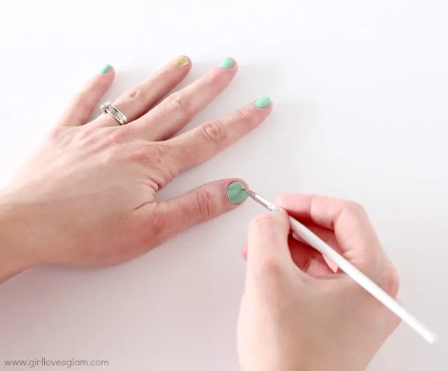 polka dot nail art tutorial on www.girllovesglam.com #tutorial #beauty