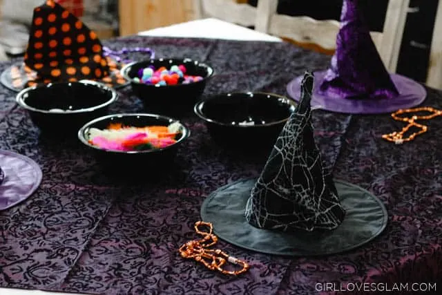 Witch Hat Decorating Halloween Party on www.girllovesglam.com