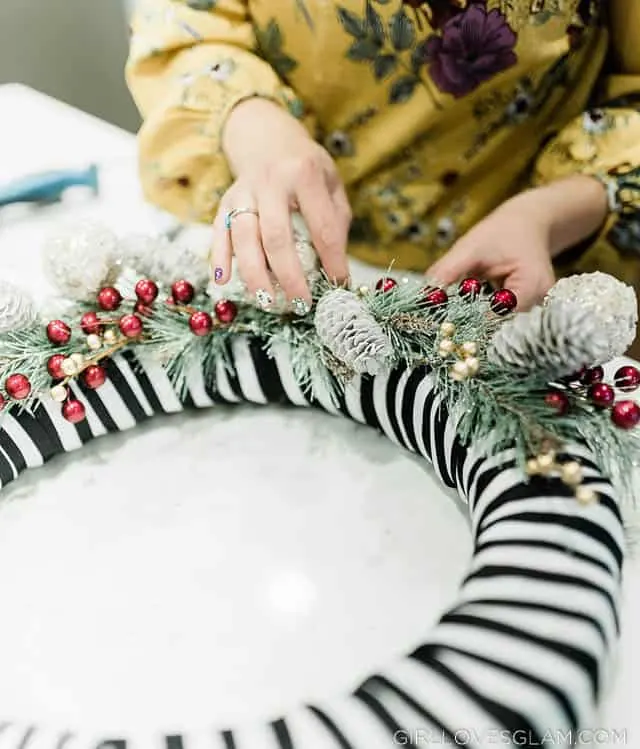 Decorating a Christmas wreath