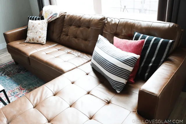 Layering neutral and colorful textiles